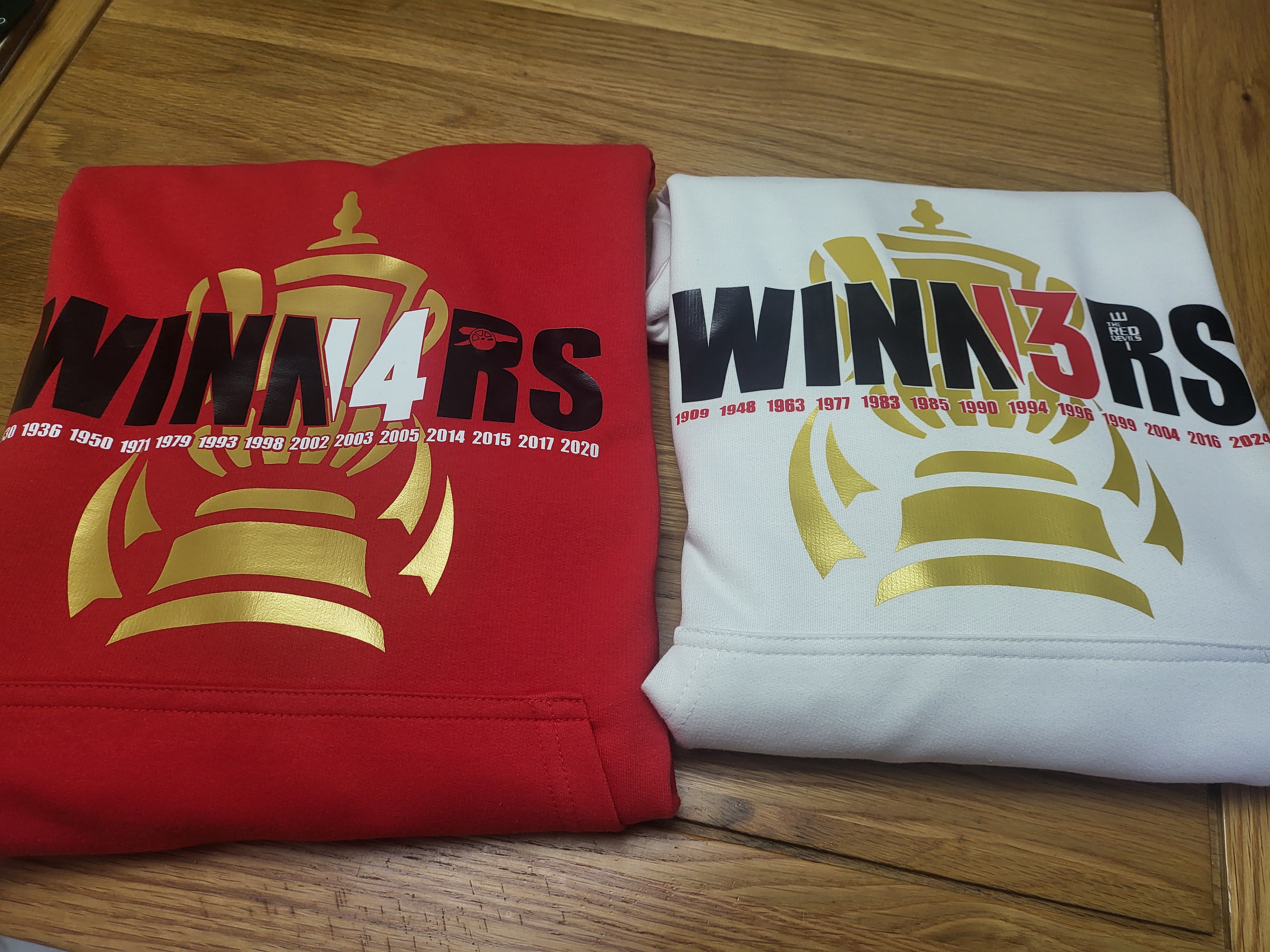 Arsenal & Man United FA cups - hoodies packed